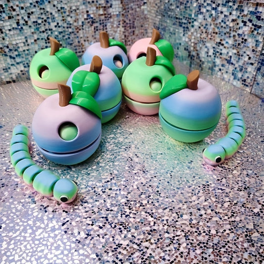 A Set of 3D Printed Vibrant Bug Apple Statues